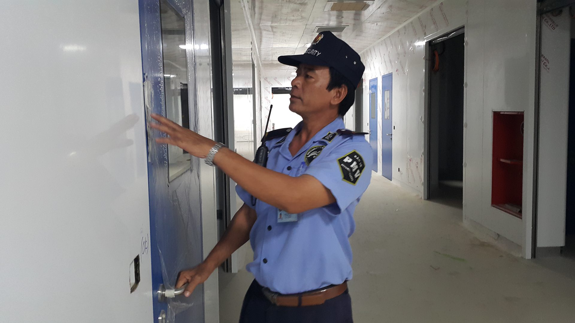 Each security guard performs a different task in the building security plan